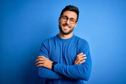 Young,Handsome,Man,With,Beard,Wearing,Casual,Sweater,And,Glasses